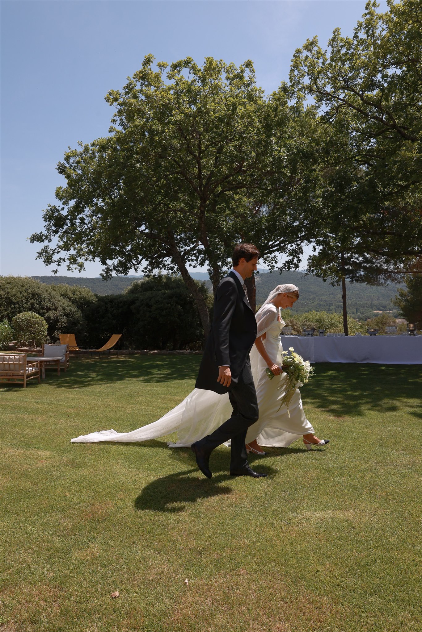 newlywed couple walking together